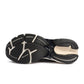 Black New Balance men's Abzorb 2010 athletic footwear with cushioned soles, designed for comfort and performance.