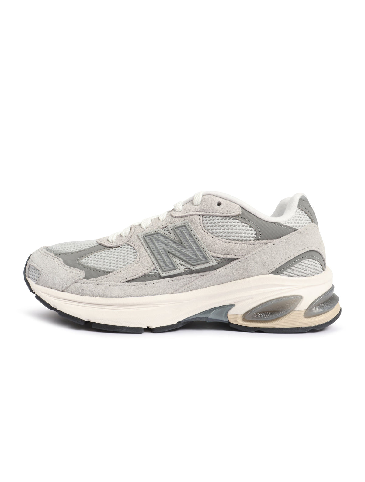 Grey New Balance Mens Abzorb 2010 footwear with cushioned sole and athletic design, displayed on a plain background.