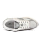 Grey New Balance men's Abzorb 2010 footwear with supportive soles, designed for comfort and style.