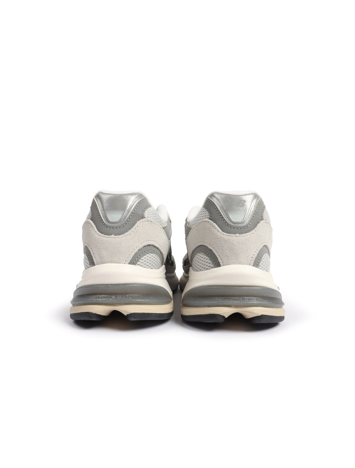 Gray New Balance men's Abzorb 2010 sneakers with supportive soles, designed for comfort and casual wear.