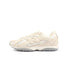 Beige New Balance women's 204L footwear with denim accents, stylish and comfortable for casual wear.