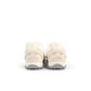 Beige New Balance women's 204L sneakers with white soles, stylish and comfortable footwear for women.