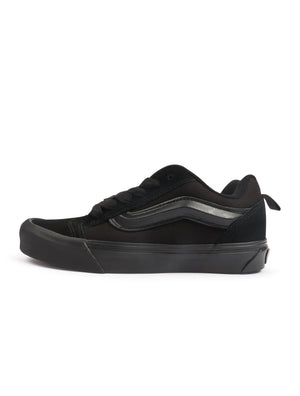 Black Vans men's Knu Skool suede and canvas sneakers with white rubber soles, featuring classic lace-up design.