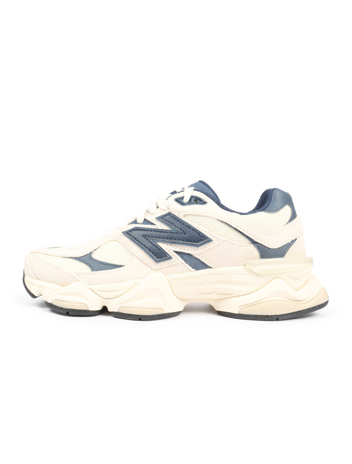 New Balance men's 9060 lifestyle shoes in cream and navy with stylish design and comfortable sneakers for everyday wear.