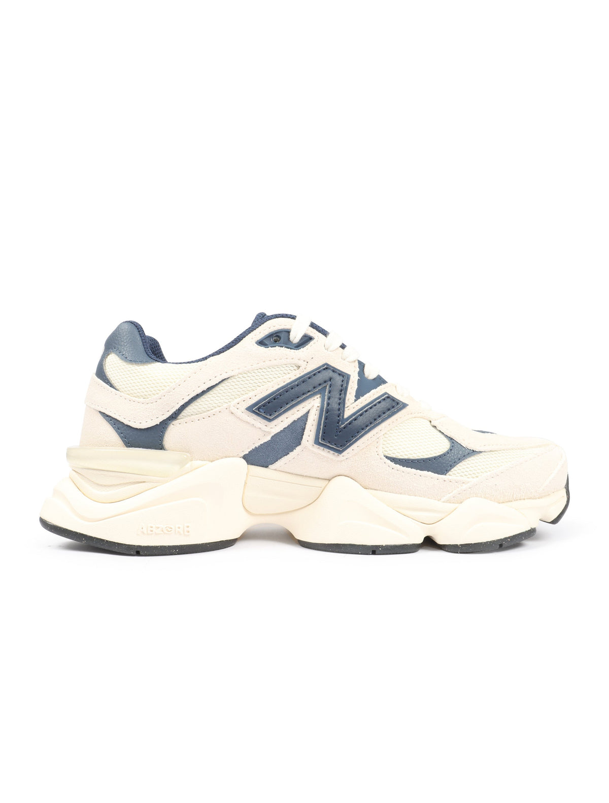 New Balance men's 9060 lifestyle shoes in cream and navy, featuring stylish design and comfortable footwear for everyday wear.