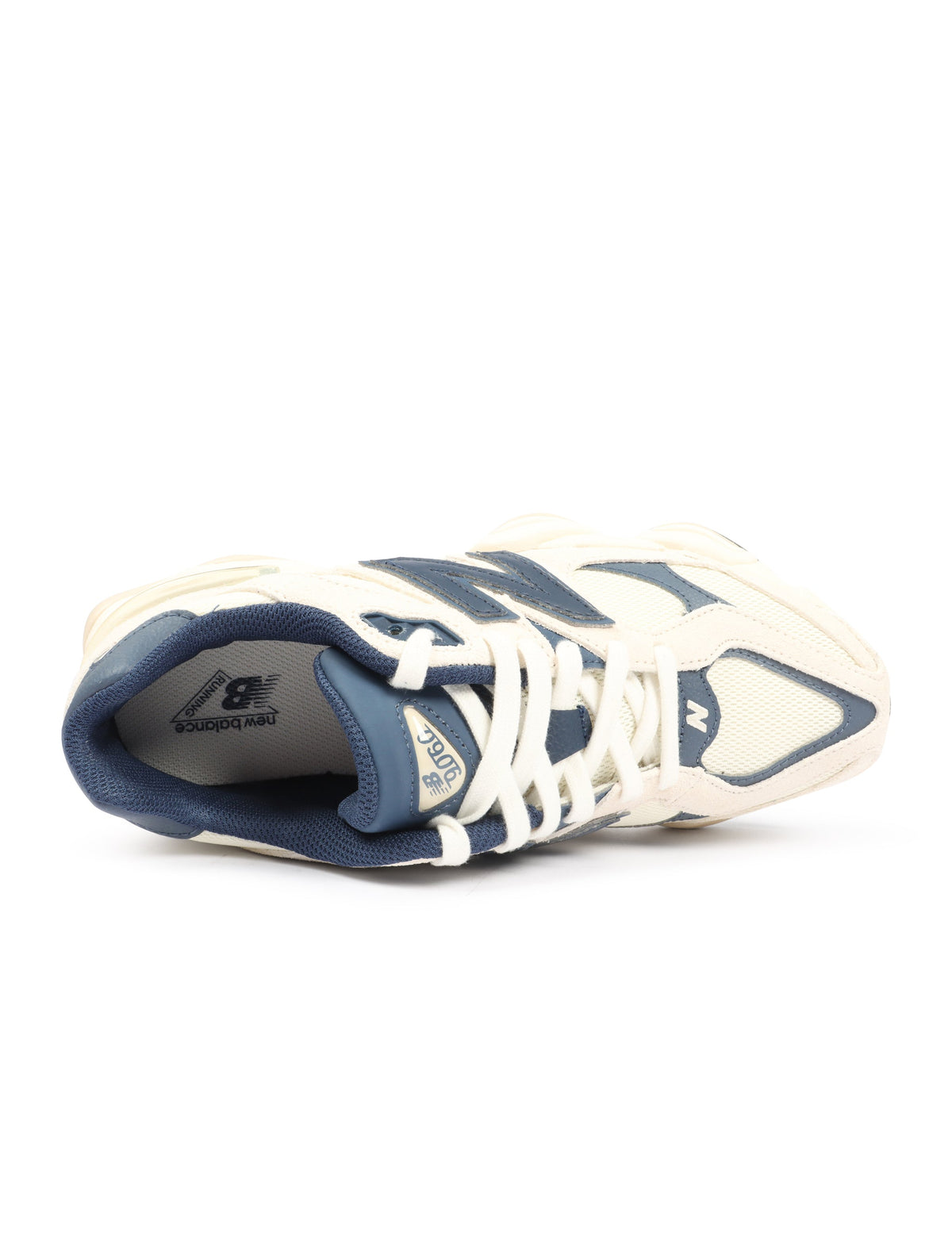 New Balance men's 9060 lifestyle shoes in cream and navy color, featuring stylish design and comfortable footwear for men.