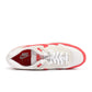 Nike Men's Air Max 1 '86 OG white and university red sneakers, classic athletic footwear with visible air cushioning.