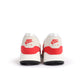 Nike Air Max 1 '86 OG men's sneakers in white and university red, featuring classic design and athletic style.