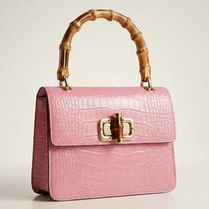 Mini Harriet bag by thebagicon featuring a sleek design with a top handle and compact silhouette, perfect for everyday use.