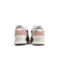 New Balance Women's 574 Rich Oak sneakers with tan and white accents, casual footwear for women, shown on a neutral background.