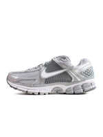 Nike men's Zoom Vomero 5 sneakers in wolf grey and white, side view