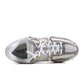 Nike men's Zoom Vomero 5 sneakers in Platinum Tint and White, side view on foot