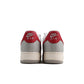 Red toe Nike Air Force 1 '07 LV8 men's footwear showing white leather sneakers with red accents and Nike branding.