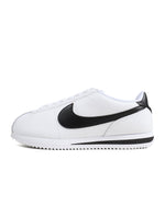 Denim Exchange men's Nike Cortez footwear in white with black accents