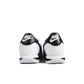 White and black Nike men's Cortez sneakers by Denim Exchange 马会