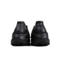 Black Adidas Mens Adifoam footwear, athletic sneakers or shoes, displayed on a plain background, showcasing their sporty design.