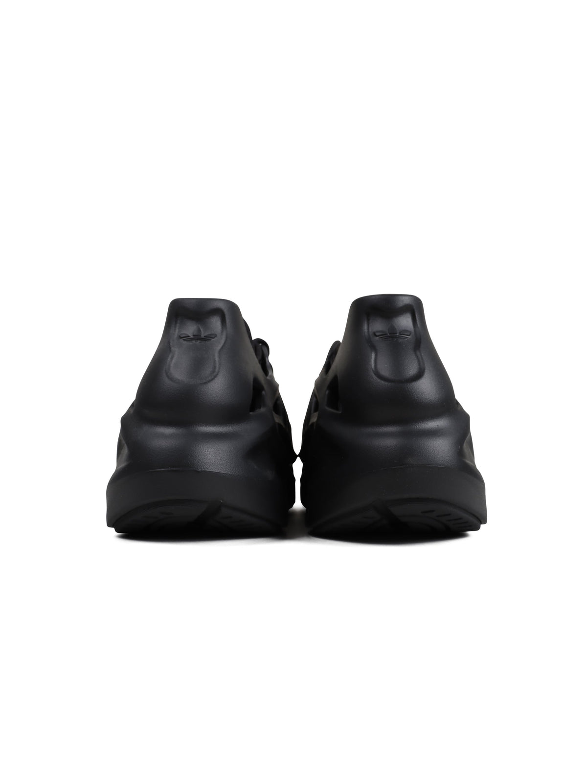 Black Adidas Mens Adifoam footwear, athletic sneakers or shoes, displayed on a plain background, showcasing their sporty design.