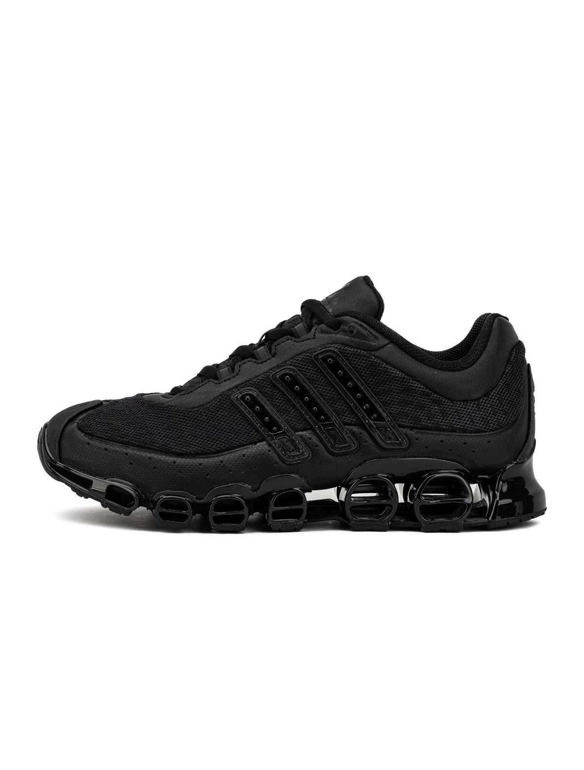 Adidas men's Megaride core black sneakers, stylish athletic footwear with sleek black design and comfortable fit.