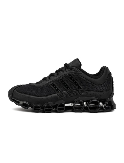 Adidas men's Megaride core black sneakers, stylish athletic footwear with sleek black design and comfortable fit.