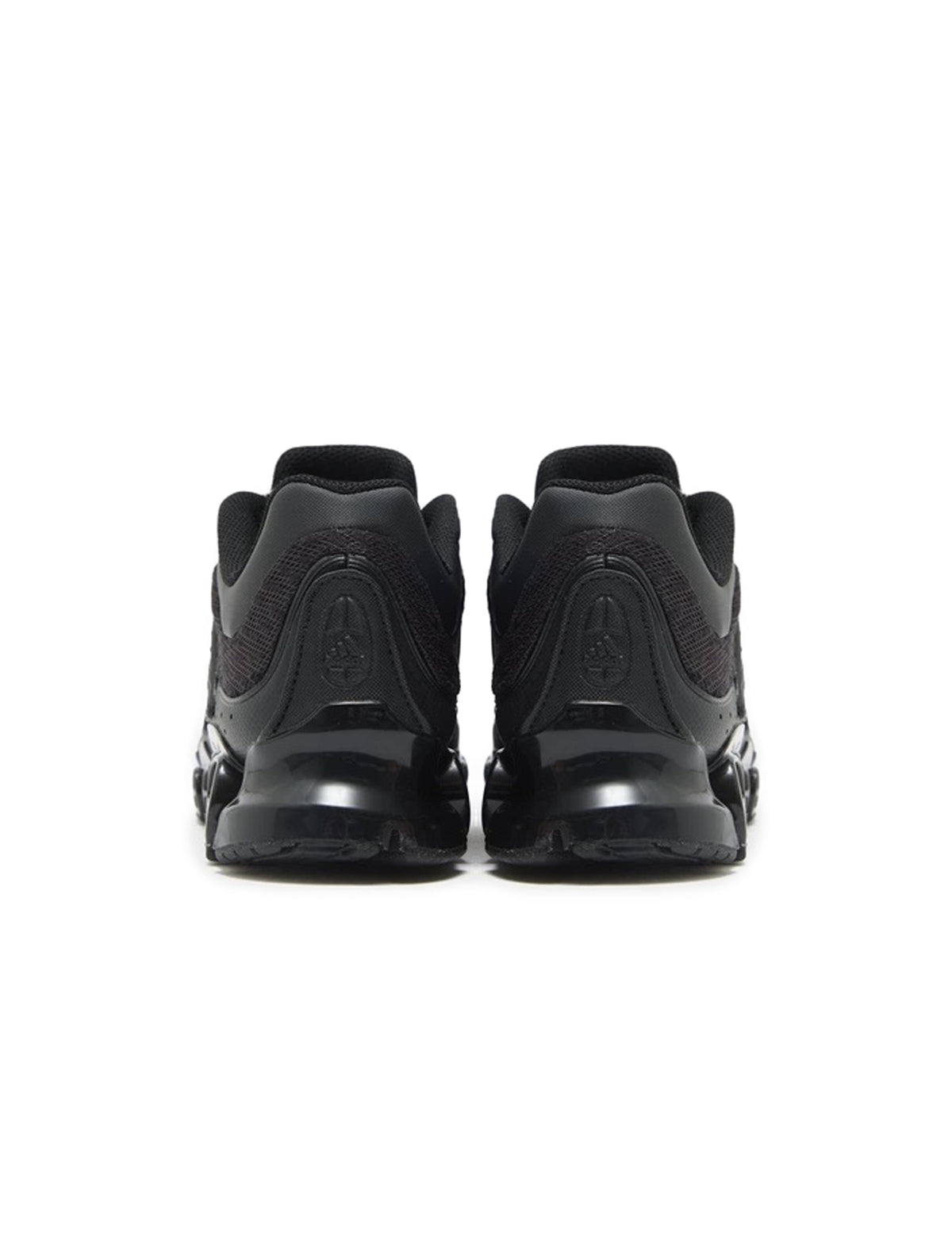 Adidas Mens Megaride core black footwear, showing sleek black sneaker with athletic design and branded details.