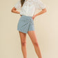 Flying Tomato afternoon Sundance woven skort shorts in blue and white with a casual, stylish design, perfect for warm weather.