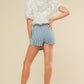 Flying Tomato Afternoon Sundance woven skort in blue and white, showing a stylish shorts design with a comfortable waistband.