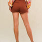 Rust Flying Tomato The Way Out Twill Skort shorts with a front wrap design and side pockets, casual and stylish for everyday wear.