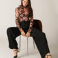 Black Elegant Essence woven pants by Flying Tomato, stylish and comfortable pants with intricate woven detailing.