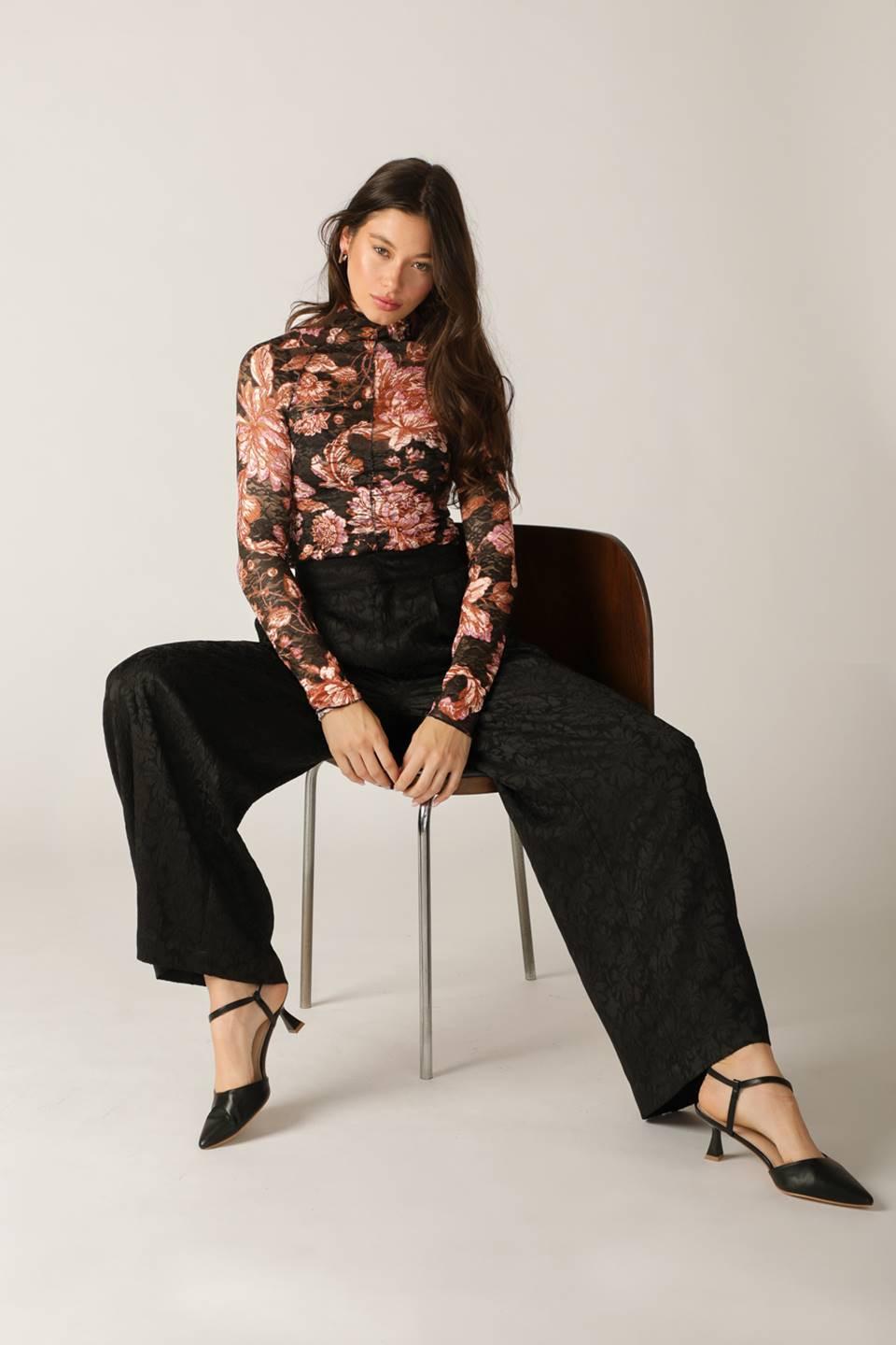 Black Elegant Essence woven pants by Flying Tomato, stylish and comfortable pants with intricate woven detailing.