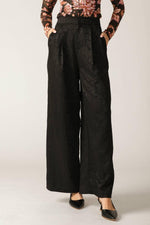 Black Elegant Essence woven pants by Flying Tomato featuring a stylish, tailored design with a comfortable fit.