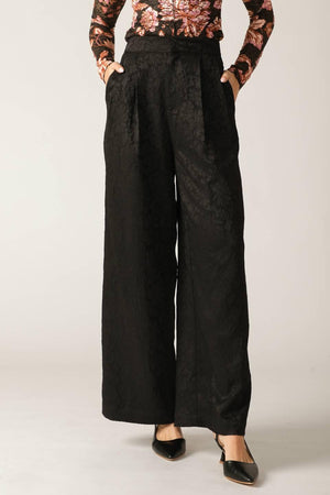 Black Elegant Essence woven pants by Flying Tomato featuring a stylish, tailored design with a comfortable fit.