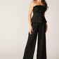 Black Elegant Essence Woven Pants by Flying Tomato, showcasing a stylish and comfortable woven pant design.