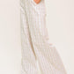 Flying Tomato Citrus Flow ivory woven pants, lightweight and stylish, with a relaxed fit and subtle woven texture.