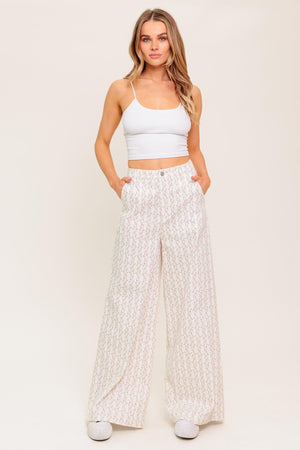 Flying Tomato Citrus Flow ivory woven pants featuring a relaxed fit and textured fabric, displayed on a neutral background.