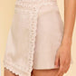 Taupe woven skort by Flying Tomato featuring a stylish, comfortable design perfect for casual summer wear.