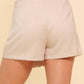 Taupe woven skort by Flying Tomato, surfing-themed shorts with a comfortable, casual design perfect for summer outings.