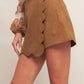 Flying Tomato desert flower faux suede skort shorts in camel color, showing the textured fabric and stylish design.