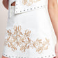 White woven skort by Flying Tomato featuring a stylish, casual design with shorts and a woven fabric appearance.
