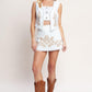 White woven shorts from Flying Tomato's All Eyes On You Woven Skort collection, featuring a stylish, casual design.