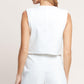 White woven shorts from Flying Tomato's All Eyes on You Woven Skort collection, featuring a stylish, casual design.