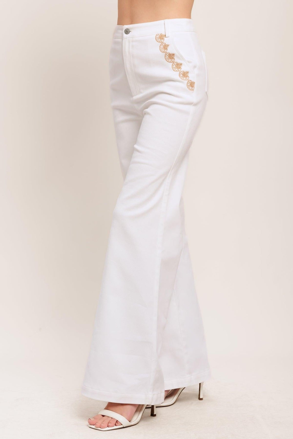Flying Tomato Open Road White Woven Pants, casual pants with a relaxed fit and woven fabric, shown on a model.