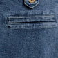 Flying Tomato Heart Eyes Denim Skort, medium indigo shorts with heart eye graphic print and frayed hem detail.