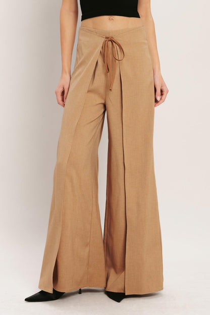 Flying Tomato caramel coast woven pants in taupe with a relaxed fit and textured fabric, displayed on a neutral background.