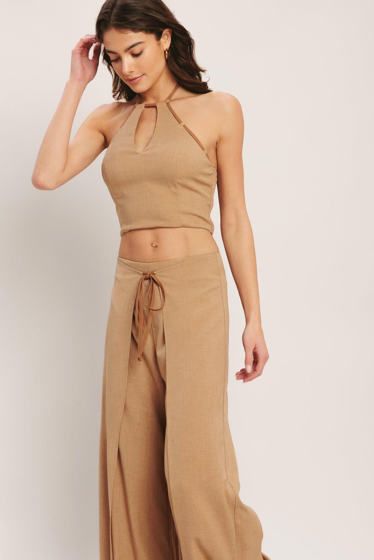 Flying Tomato Caramel Coast woven pants in taupe, featuring a relaxed fit with textured fabric and casual style.