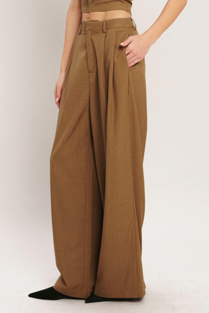 Flying Tomato Umber Flow woven wide-leg pants in brick color, featuring a relaxed fit and flowing fabric design.