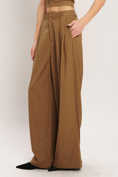 Flying Tomato Umber Flow woven wide-leg pants in brick color, featuring a relaxed fit and flowing fabric design.