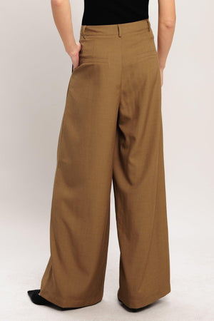 Flying Tomato Umber Flow woven wide-leg pants in brick color, featuring a relaxed fit and stylish design.
