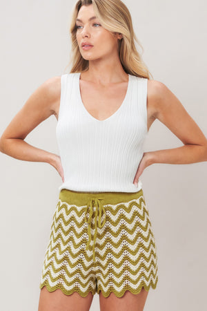 Olive white crochet knit shorts by Flying Tomato with sunset stitch pattern, casual summer style, front view image.