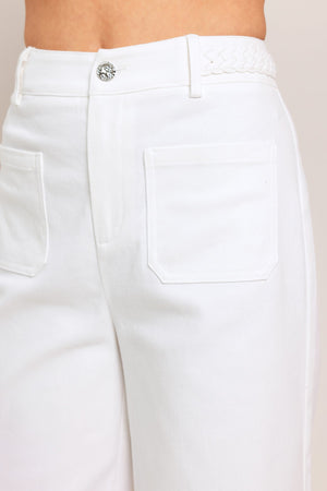 White Ease Woven Wide Pants by Flying Tomato, featuring a relaxed fit and woven fabric, displayed on a neutral background.