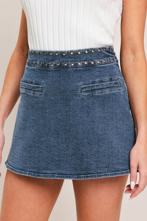 Flying Tomato Sweet Stud Denim Skort in medium indigo with stud embellishments, casual stylish design for warm-weather outfits.